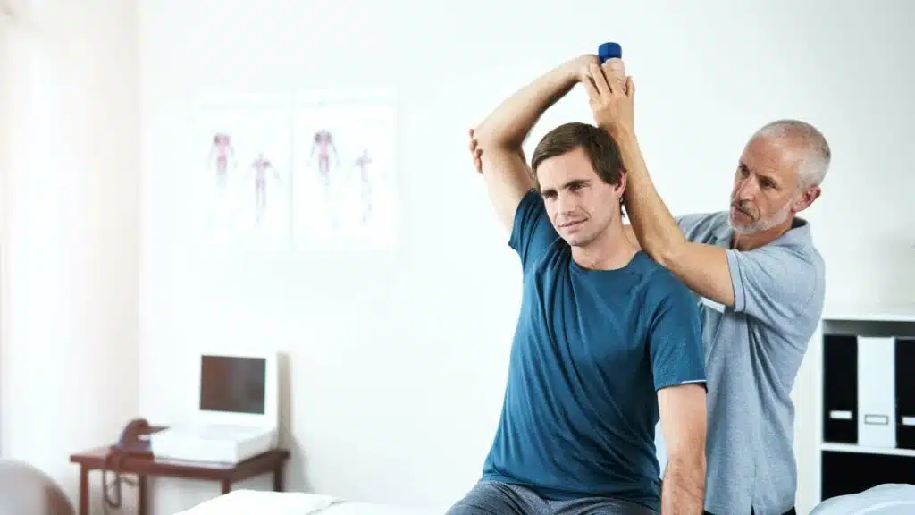 A man improving his range of motion through physiotherapy